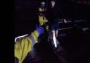 Jordan North is guided to safety by coastguard staff (RNLI/PA)