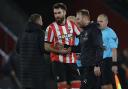 Simon Rusk and Saints former Ben Brereton Diaz (right) after defeat to Liverpool.