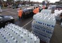 Long queues as people collect bottles of water at Places Leisure in Eastleigh.