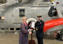 Worshipful Company of Fuellers, Junior Warden Louise Thompson presents the top academic award to and Lt Laurence Helmore