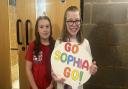 Sophia Hill, left, has been called 'an inspiration' for raising money for Lily Peacock, right, as she tries to raise money for an assistance dog.