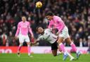 Nathan Wood in action against Fulham’s Rodrigo Muniz at Craven Cottage