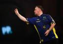 Luke Littler moved into the last 16 of the PDC World Darts Championship (Zac Goodwin/PA)