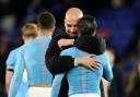 Manchester City manager Pep Guardiola, centre left, celebrated a milestone occasion with a much-needed win (Joe Giddens/PA)