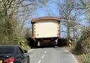 Mobile home stuck on railway bridge on Allington Lane
