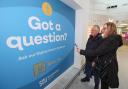 Travellers lining up to use the new AI assistant at Southampton Airport.