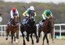 Salamanca (white hat) holds on well (Richard Sellers/PA)