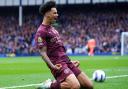 Manchester City’s Nico O’Reilly celebrates scoring their side’s first goal (PA)