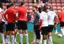 Adam Lallana talking to Southampton players ahead of their Premier League game against Fulham.