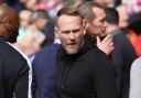 Simon Rusk in the dugout to face Fulham in the Premier League.