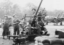 An anti-aircraft gun crew at Holmsley South airfield.