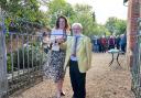 MP Caroline Nokes and Cllr John Parker cut the ribbon at King John House's VE Day event on Monday, May 5.