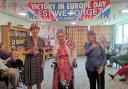 From left: Residents Margaret Jarman, April Nye and Joyce Ponsonby celebrate the VE Day anniversary at Colten Care’s Kingfishers in New Milton, Hampshire