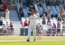 Nottinghamshire's Liam Patterson-White celebrates completing his first century at Trent Bridge on day three of the Rothesay County Championship match against Hampshire