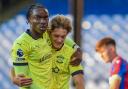 Match winners Derrick Abu and Dom Ballard celebrate victory in the Premier League 2 play-offs semi-final