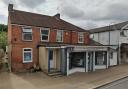 A new three-storey development featuring 12 flats and two shops could replace an existing building in Totton's town centre