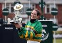 Rachael Blackmore receives the Randox Grand National trophy (David Davies/PA)