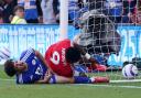 Taiwo Awoniyi (right) has been placed in an induced coma following an injury suffered against Leicester (Jacob King/PA)