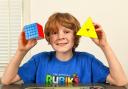 Pictured Jacob Moletti practices with his favourite cubes that he competes with, at his home in Southampton, Hants.