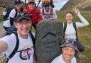 Romsey School staff celebrate summit of Snowdon during charity trek