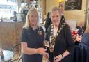 Rose Timms being presented her award by the Mayor of Eastleigh Councillor Janice Asman.