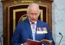 The King during the speech from the Throne on the Senate floor in Canada (PA)