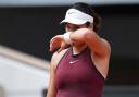Emma Raducanu was well beaten by Iga Swiatek (Christophe Ena/AP)