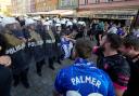 Riot police confront fans ahead of the Europa Conference League final (AP Photo/ Czarek Sokolowski)