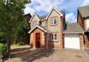 Attractive four-bedroom detached home with driveway parking