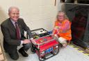 Sir Julian Lewis MP tours New Forest charity sending 650th generator to Ukraine