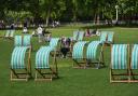 People enjoying the warm weather in London's St James's Park on the first day of the Meteorological summer (June 1)
