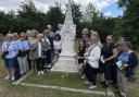 Nurses from Michigan lay flowers at Nightingale’s grave in Wellow