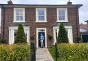 One of teh first homes built by Thakeham at Welborne. Tristan Robinson from the company on the doorstep.