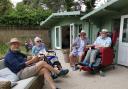 Enjoying a picnic in the garden at Colten Care’s The Aldbury in Poole.