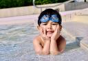 A child enjoying the paddling pool