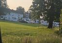 Six caravans have been spotted on a field in-between Green Park and Mansel Park.