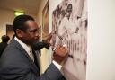 2013: Opening of new Hampshire Cricket Community Trust Study Centre at the Utilita Bowl called The Orbit -  West Indies batsman Gordon Greenidge signs his photograph that is on display