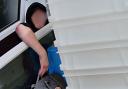 The audacious scene was caught on the packing area's CCTV