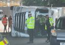 Lorry crashes on its side under Redbridge flyover - live updates