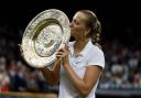 Petra Kvitova kisses the Wimbledon trophy in 2014 (Jonathan Brady/PA)