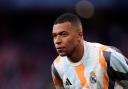 Kylian Mbappe will continue his recovery back at Real Madrid’s team base (John Walton/PA)