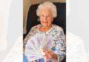 Sylvia celebrates a big play-money win at Snowdrop Place race night
