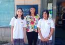 Year 9 students Siri and Amitis with Thornden School headteacher Caroline Lowing