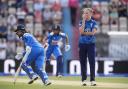 England's Lauren Filer (right) reacts as India's Harleen Deol (left) and Pratika Rawal (centre) hits more runs during the Women's IT20 at the Utilita Bowl, Southampton.
