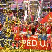 Nottingham Forest players celebrate with the trophy winning promotion to the Premier League after the Sky Bet Championship play-off final at Wembley Stadium, London. Picture date: Sunday May 29, 2022. PA Photo. See PA story SOCCER Championship. Photo