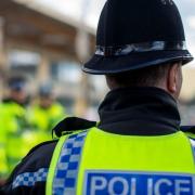 Two men have been charged after a man in his 50s was seriously assaulted during an alleged robbery attempt in Gosport.