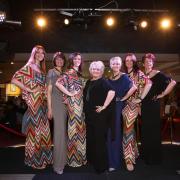 Sandy takes centre stage at one of her Ladies Let's Lunch charity fashion events at The Concorde Club