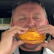 A dad ordered the 'UK's first Real Cheeseburger' after demanding Burger King stack his meatless bun with 20 slices of cheese
