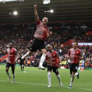 Taylor Harwood-Bellis celebrates scoring the opening goal against Birmingham City.