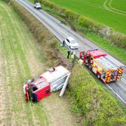 Shocking photograph shows fire engine on its side after crash near Winchester